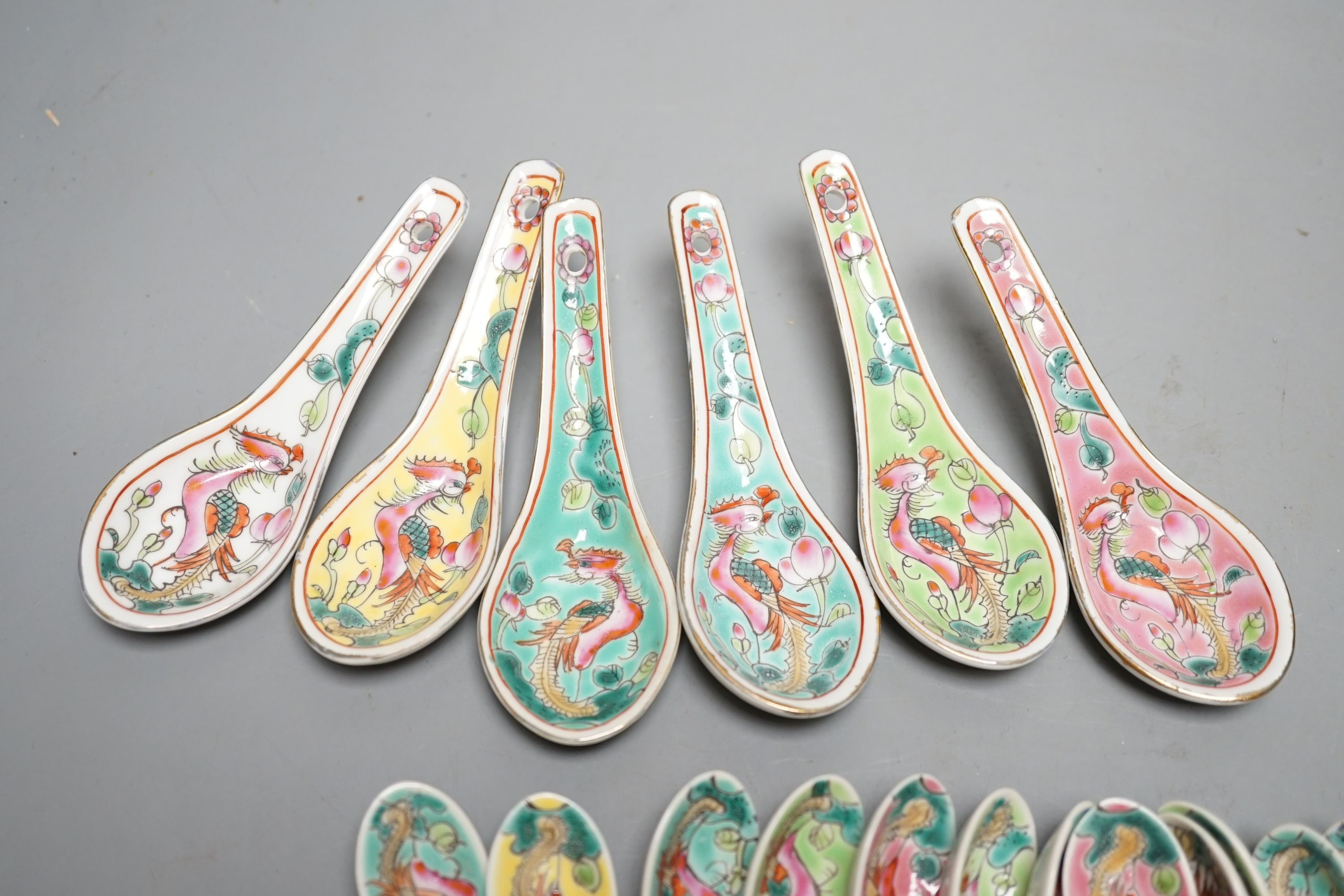 A collection of Chinese Straits porcelain spoons and a dish